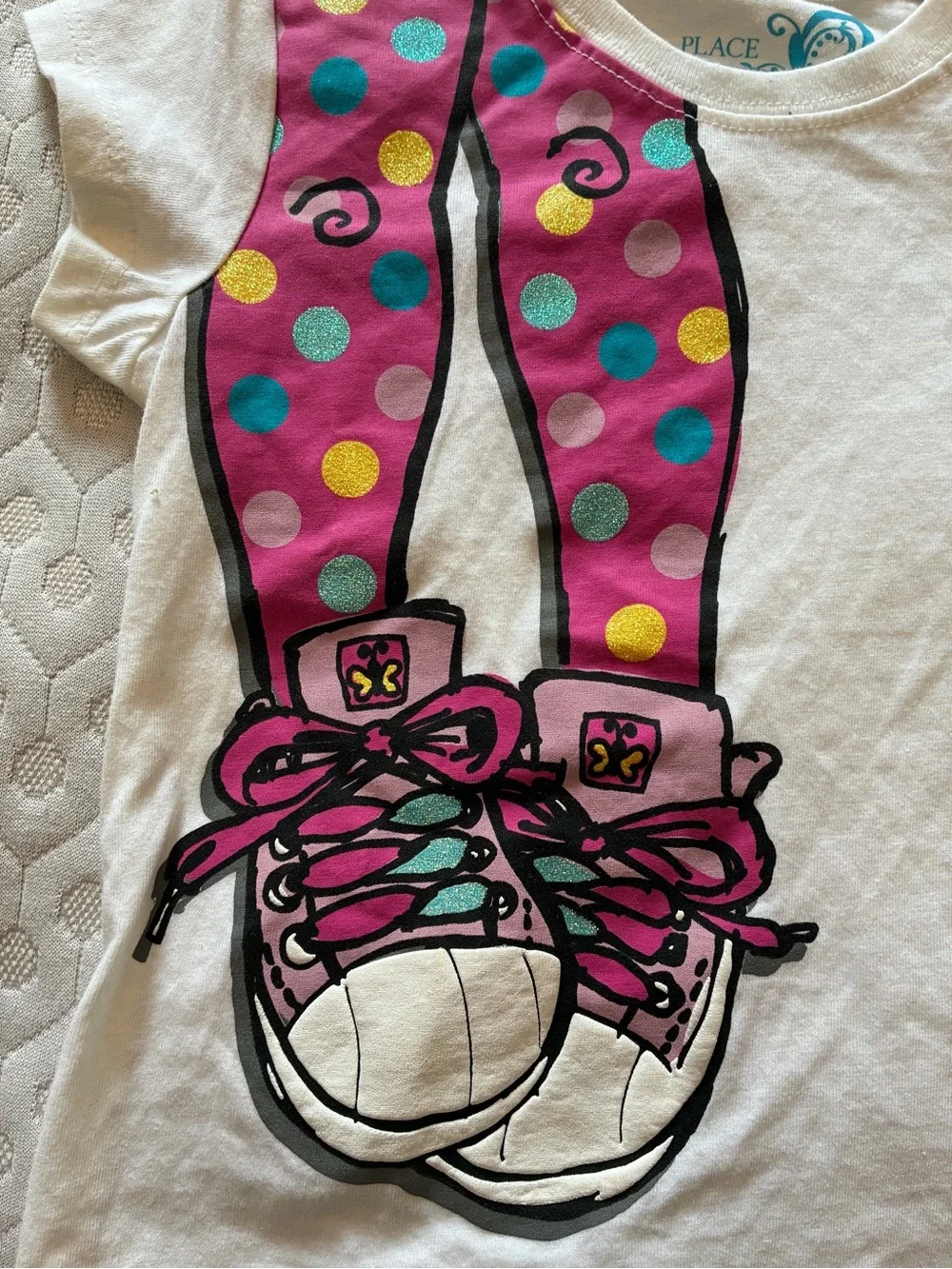 Girl’s White Graphic Tee with Pink Polka-Dot Sneaker Design